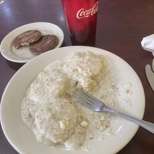 My yummy full size Biscuits and gravy. And Diet Coke. Total $6.00 + $4.00 + $2.29 = $
