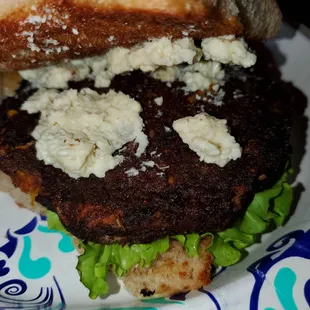 Veggie burger with blue cheese.  (Black beans)