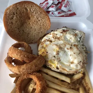 Rouge burger to show the egg Half onion rings half fries