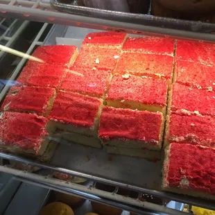 a red cake and pastries