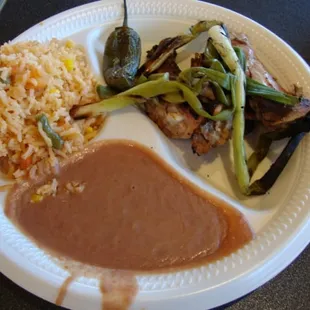1/4 order of Grilled Chicken, Rice and Beans - Rico Pollo N Chambers Location - October 5th 2013