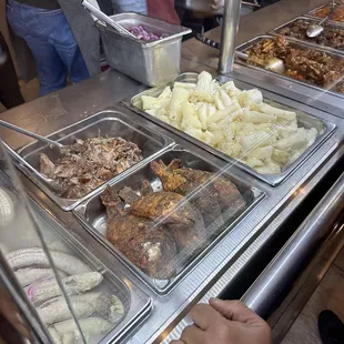a buffet with a variety of food items