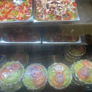 a display case filled with different types of food