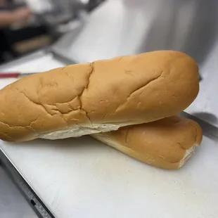 two buns on a cutting board