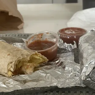 Bacon egg and cheese burrito and salsa