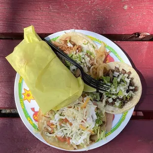 From top: carnitas taco, carne asada taco, pescado taco, taco dorado