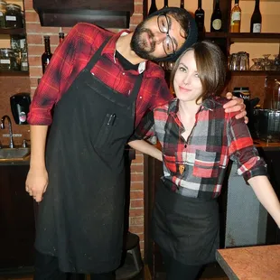 a man and a woman posing for a picture