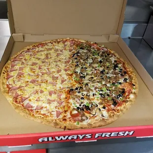a pizza in a pizza box