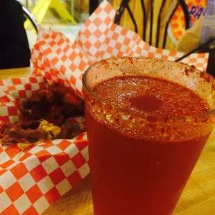 a glass of tomato sauce