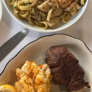 Surf &amp; turf (it was ok) but the Alfredo clam pasta was super yummy