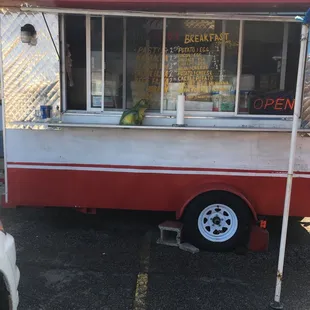 a red and white food truck