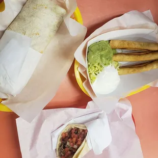 two burritos and guacamole