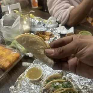 This place is a joke these are not tacos they are so small for a large price ridiculous never coming back