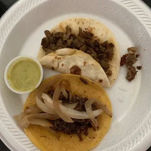 One fajita taco and one barbacoa taco