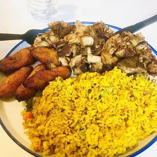 Boneless jerk chicken plate with plantain and rice