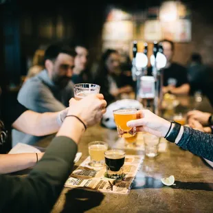 Cheer&apos;s with old friends and new!  Samples included on the Bike&apos;s + Brews Tour.