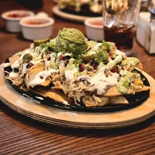 a plate of nachos on a table
