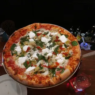 Build Your Own Pizza - artichoke hearts, ricotta, spinach and peppers. Absolutely delicious! Crust was flavorful and crispy.