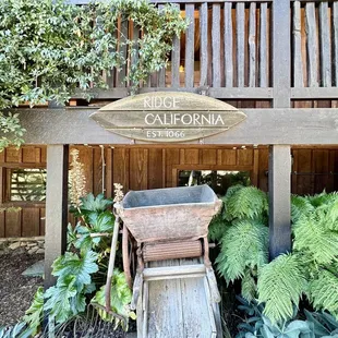a wheelbarrow and a sign for ridge california