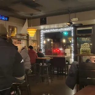 people sitting at the bar