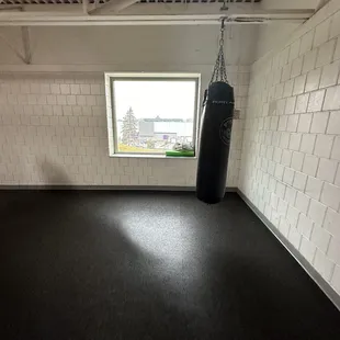 Track window with punching bag