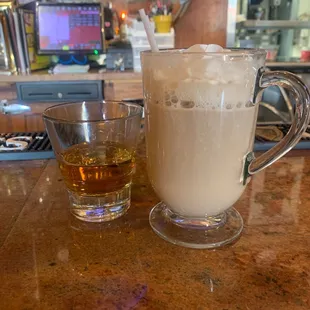 a drink and a beverage on the bar