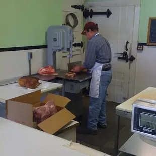 a man preparing meat