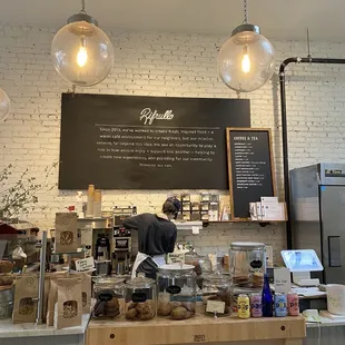 a man working in a coffee shop