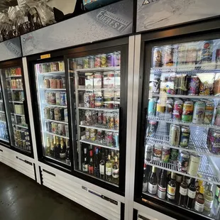 a row of refrigerators in a store