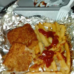 Gross oven baked french fries and 'fish'??