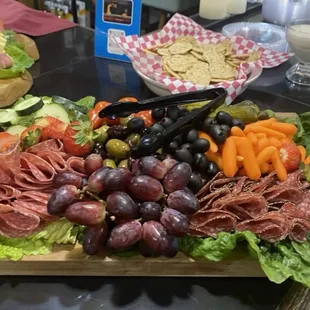 a platter of meats and vegetables