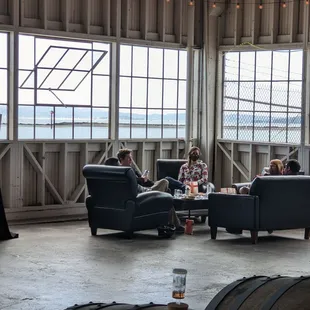 a group of people sitting in recliners