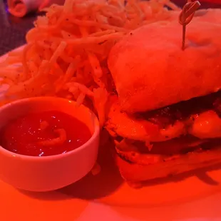 Chicken sandwich with matchstick fries.