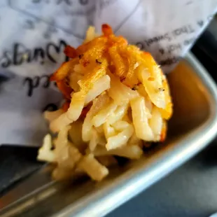  a closeup of a fried macaroni and cheese