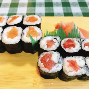 a plate of sushi and a plate of sushi