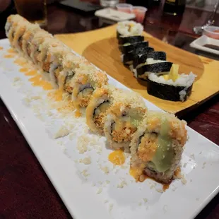 a sushi roll on a white plate