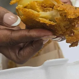 Fried green tomato that was raw on the inside.