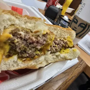 Pink, unseasoned burger.