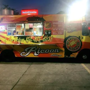 a food truck parked in a parking lot