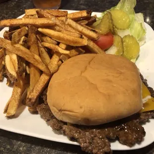 a hamburger and fries on a plate