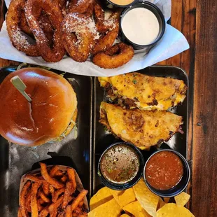 HH - Onion rings, spicy sauce, ranch, Burger with sweet potato fries, QuesaBirria tacos with consume, chips and salsa!