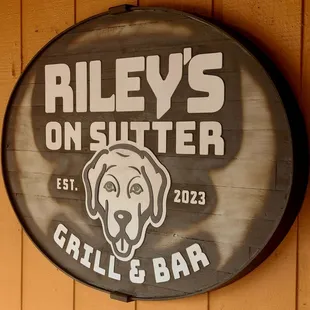 a dog's head on a sign