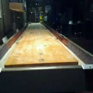 a shuffle table in the basement