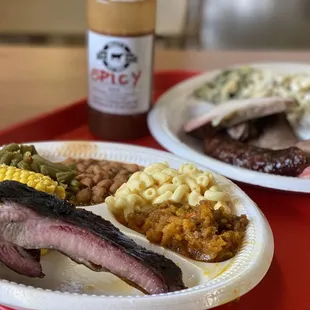 two plates of food on a tray