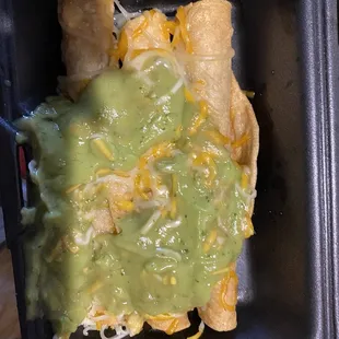 3 Rolled Tacos with Cheese and Guacamole