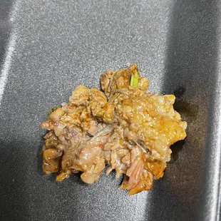 a piece of meat in a pan