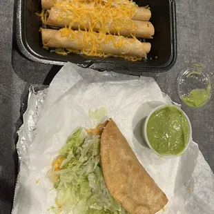 Rolled Tacos (Gauc on the side) and Hard Shell Shredded beef taco.