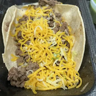 Carne Asada Taco (No Pico and Gauc on the side &amp; add cheese)