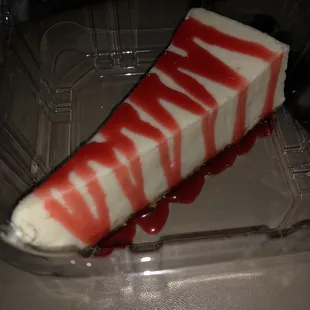 Cheesecake with delicious strawberry syrup. Wow!