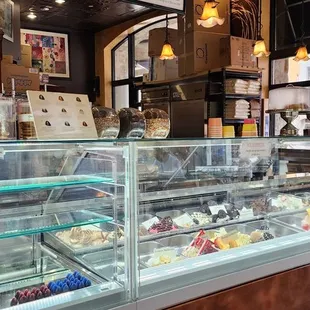 a display case with a variety of gelatos